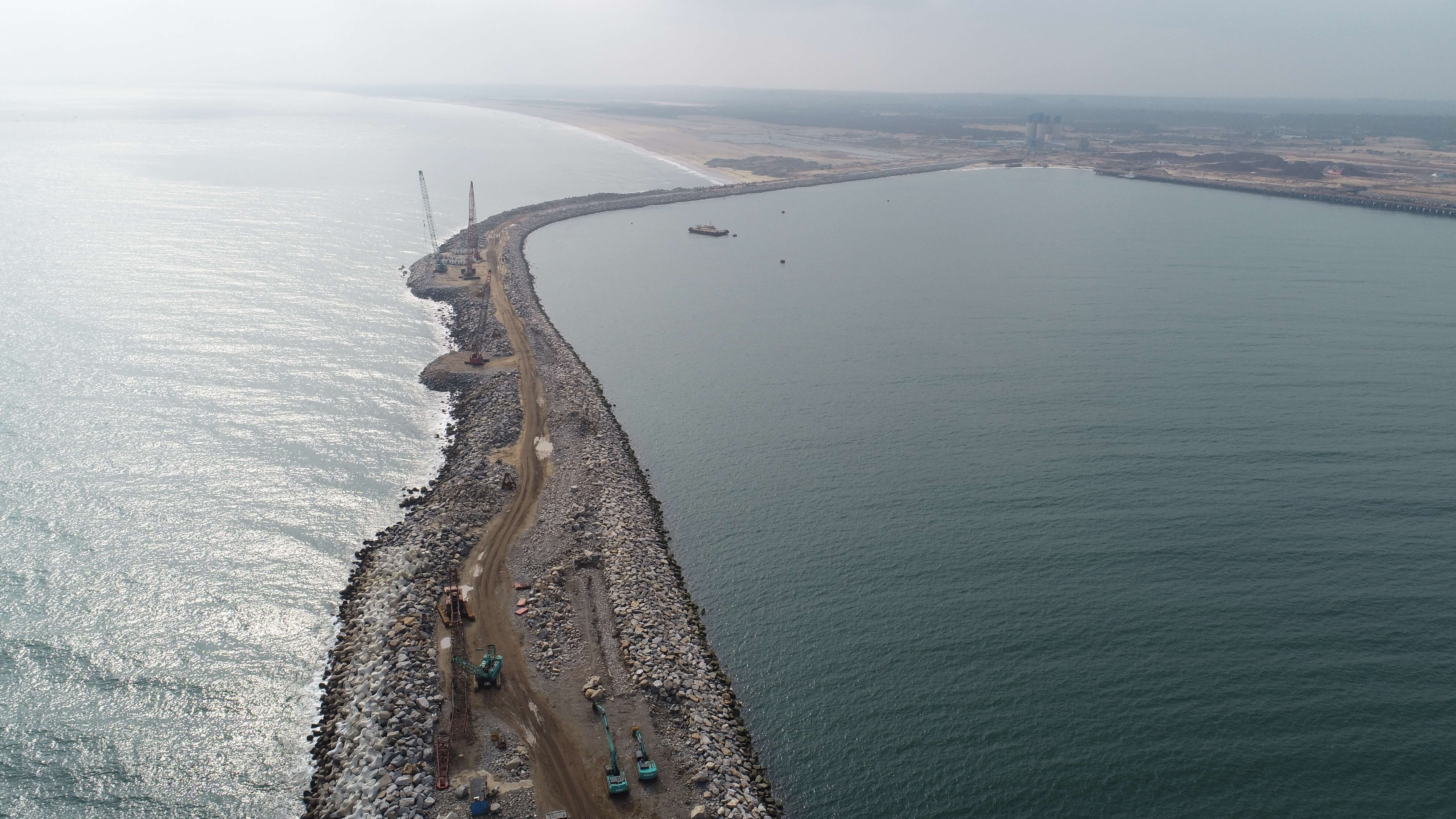 The south breakwater, which is being rebuilt and extended, was damaged twice by devastating cyclones during construction period