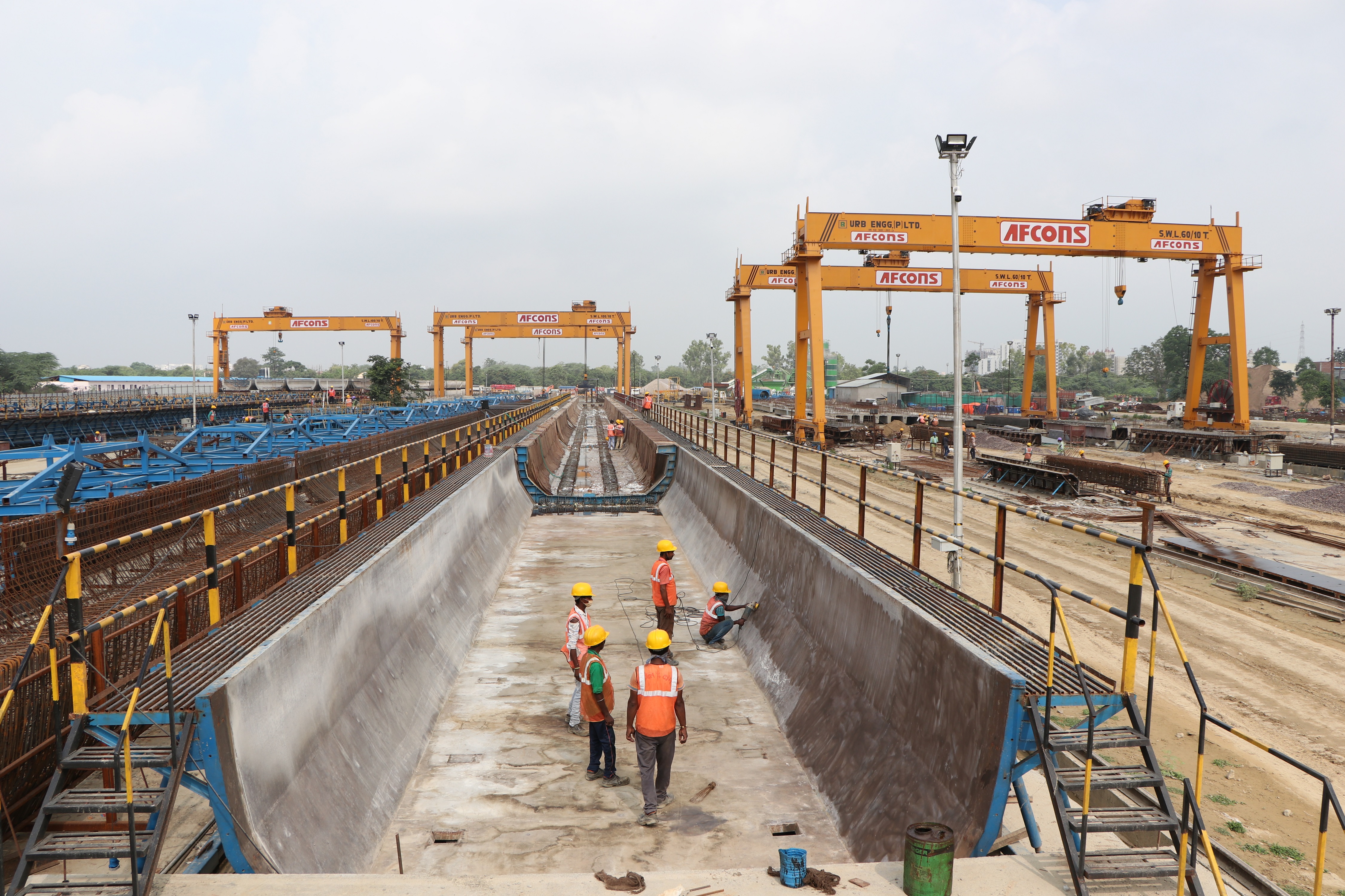 U-Girder Prefabricated shutters being cleaned for next cycle of U-Girder casting 