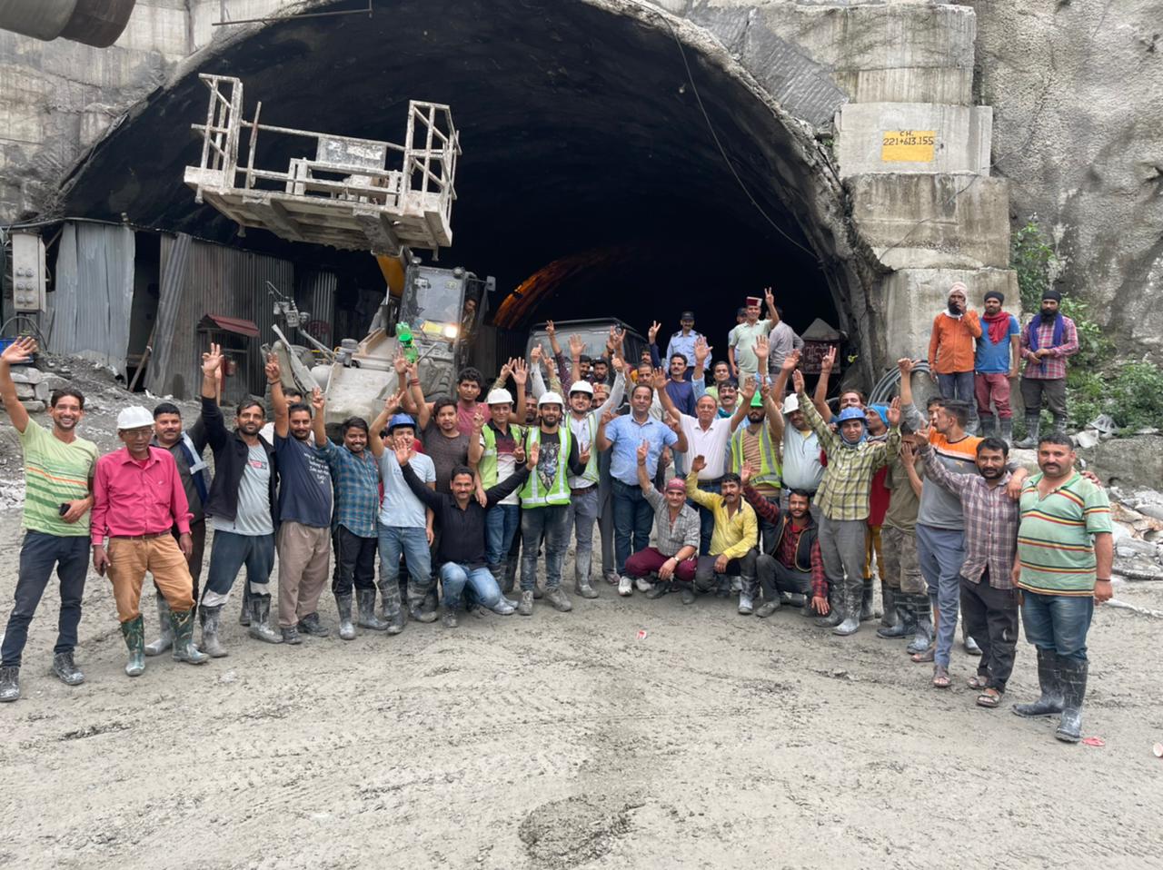 The team celebrating the breakthrough outside Tunnel T4-03