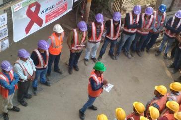 Sensibilisation au sida sur l'un des sites d'Afcons